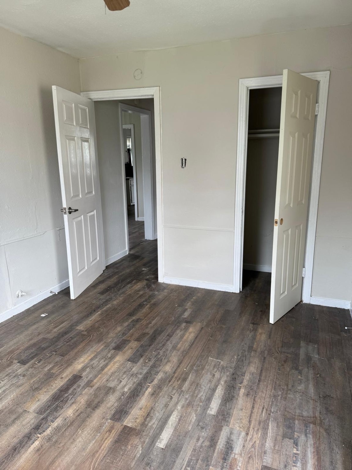 2238 Hutton Street Houston, TX 77026 - Photo 7 of 10 a view of a hallway with wooden floor and closet