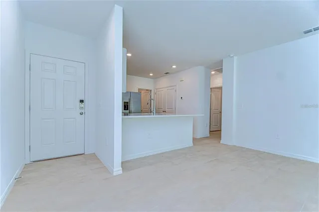 a view of a kitchen with a sink