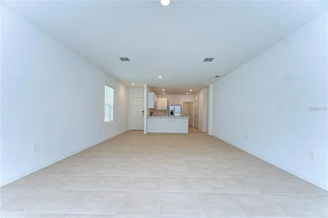 a view of a livingroom with furniture and window
