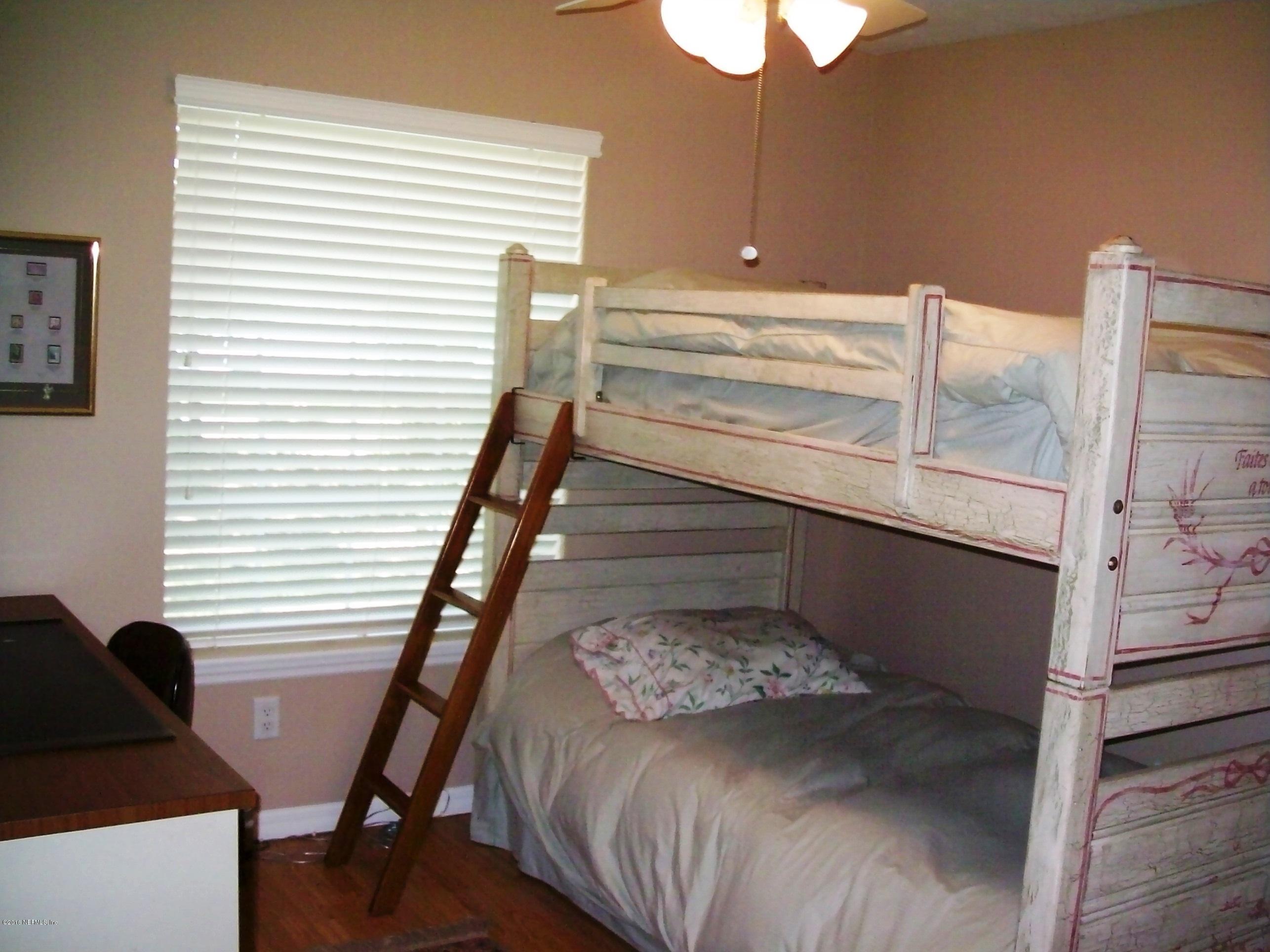7966 Breezy Point Road West Melrose, FL 32666 - Photo 8 of 21 14) Bedroom 3