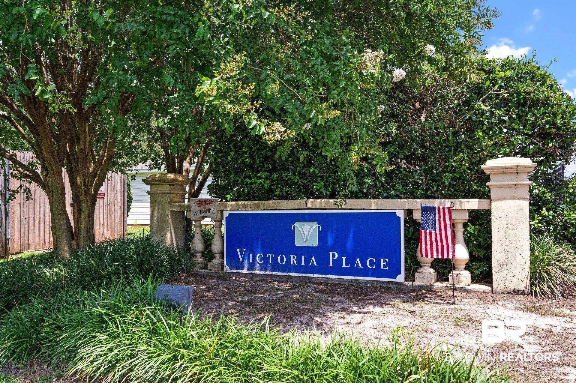2651 South Juniper Street, Unit 2002 Foley, AL 36535 - Photo 23 of 23 Community entrance sign featuring stone pillars and balustrade