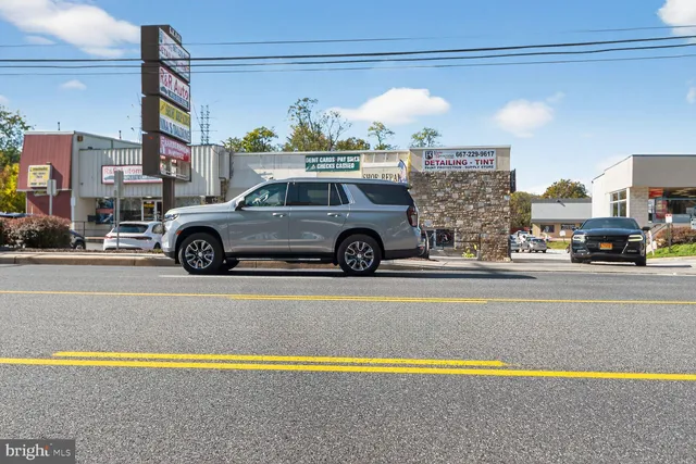 a view of parking space with cars
