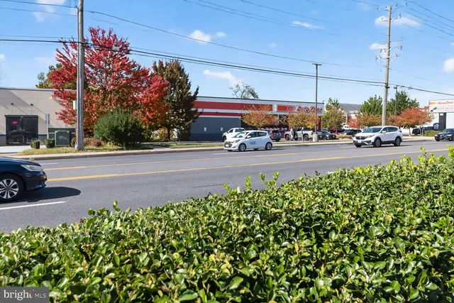 a view of a street with cars