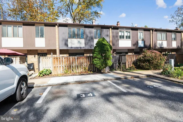 a view of a car park in front of a building
