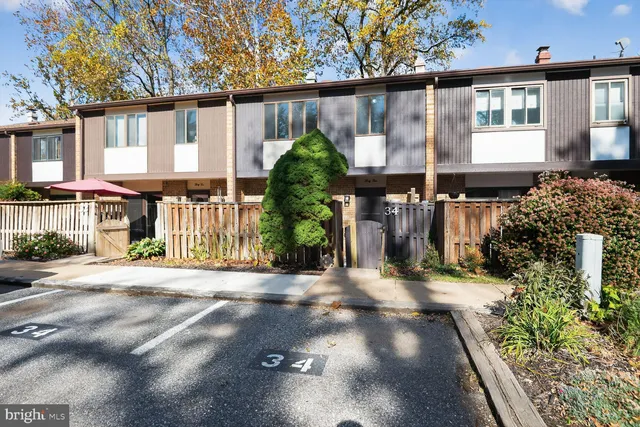 a view of a house with a street