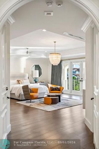 a view of a living room and hardwood floor