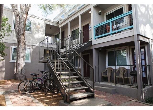 1106 West 22nd Street, Unit 3 Austin, TX 78705 - Photo 2 of 5 a view of a house with iron stairs