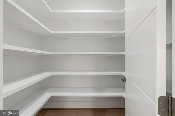 a spacious bathroom with a double vanity sink mirror and