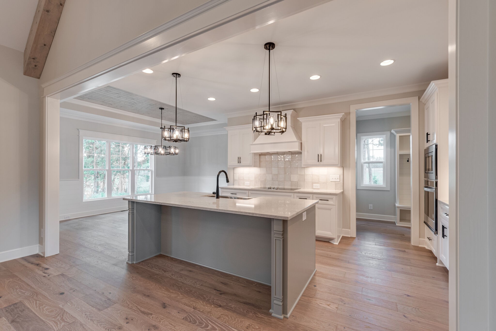 1497 Phillips Road Lebanon, TN 37087 - Photo 11 of 43 a large kitchen with kitchen island a sink stainless steel appliances and cabinets