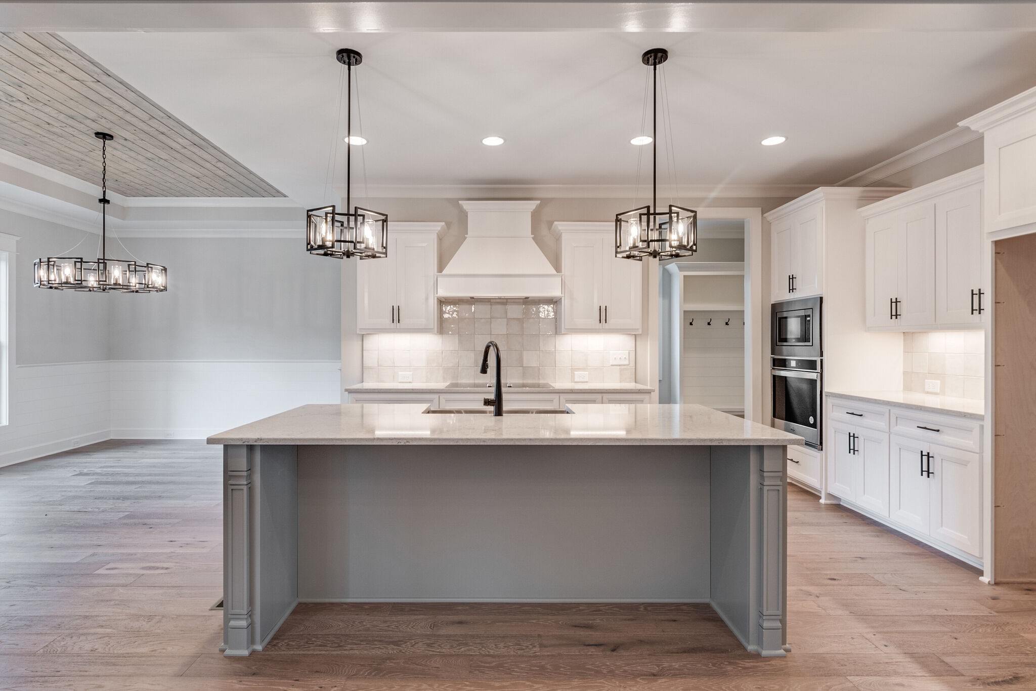 1497 Phillips Road Lebanon, TN 37087 - Photo 12 of 43 a kitchen with kitchen island granite countertop a sink a counter space appliances and cabinets