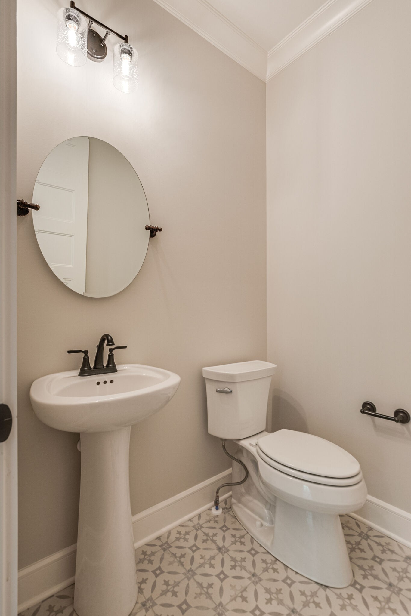 1497 Phillips Road Lebanon, TN 37087 - Photo 22 of 43 a bathroom with a sink mirror and toilet