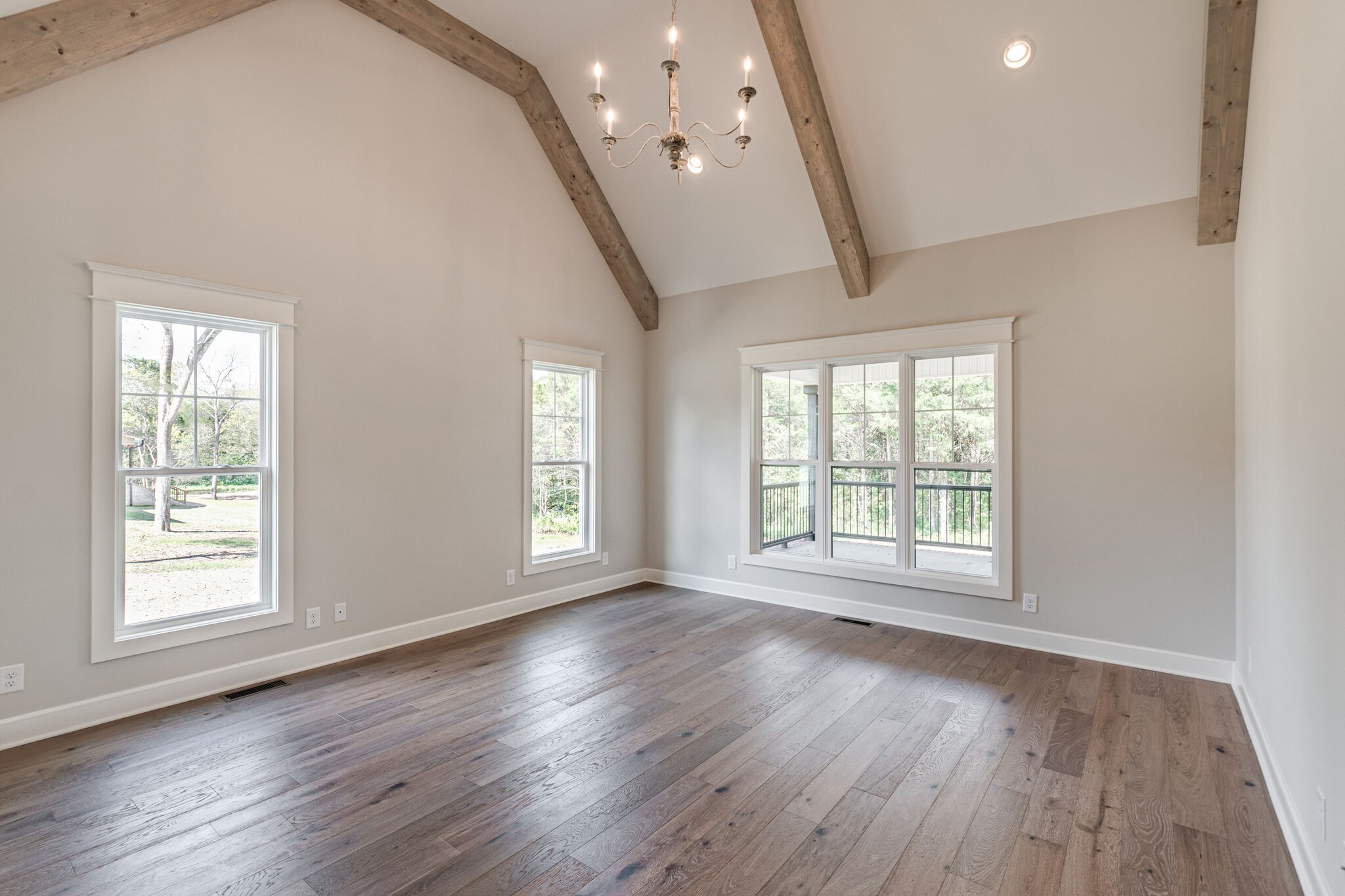 1497 Phillips Road Lebanon, TN 37087 - Photo 23 of 43 a view of an empty room with wooden floor and a window