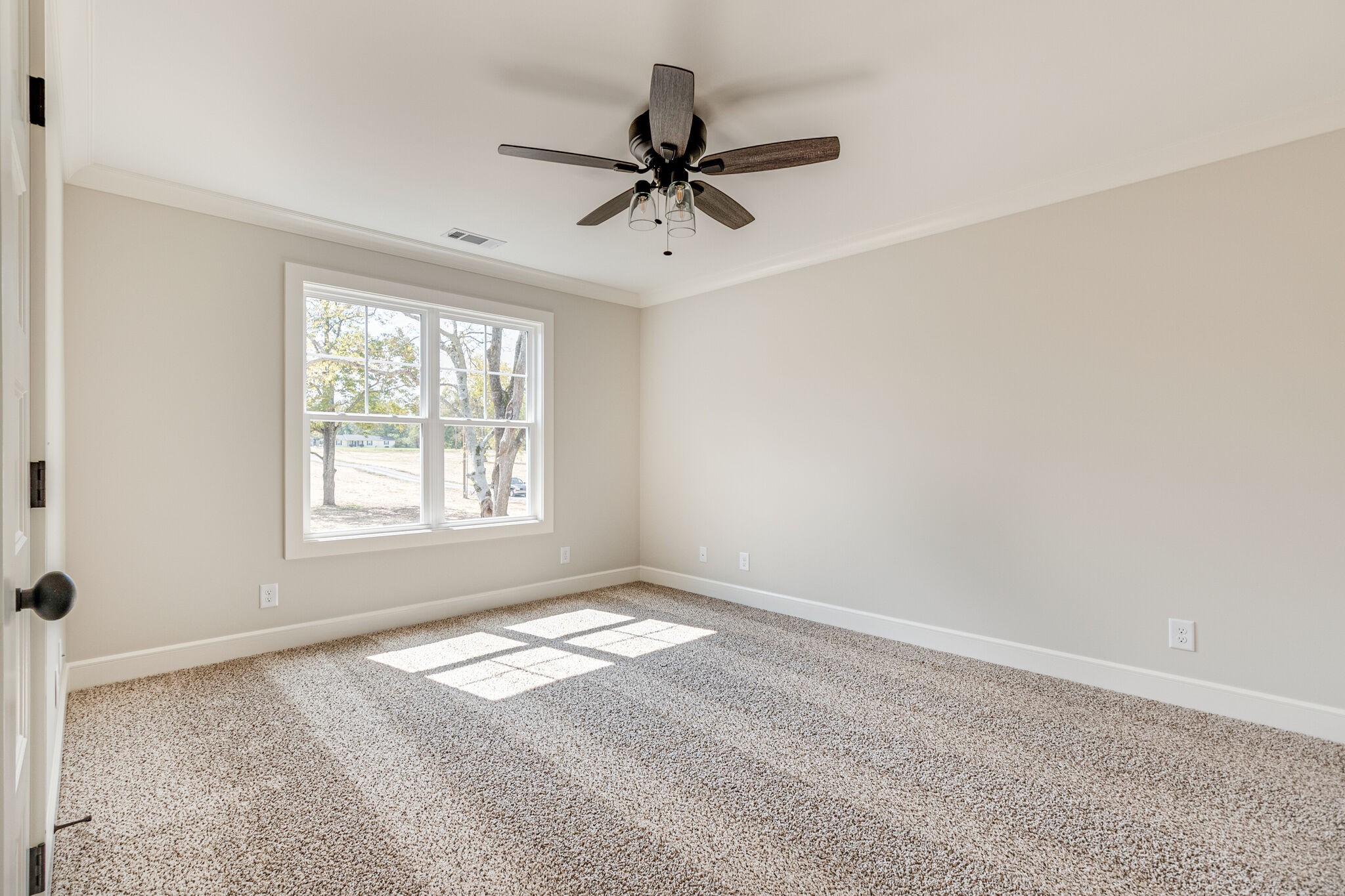 1497 Phillips Road Lebanon, TN 37087 - Photo 33 of 43 a view of a livingroom with a ceiling fan and window