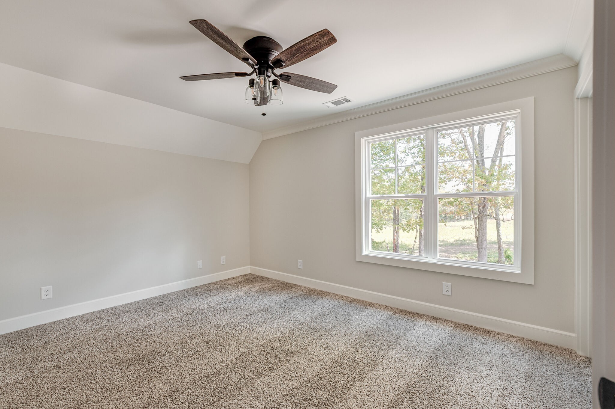 1497 Phillips Road Lebanon, TN 37087 - Photo 34 of 43 a view of a big room with windows and chandelier fan