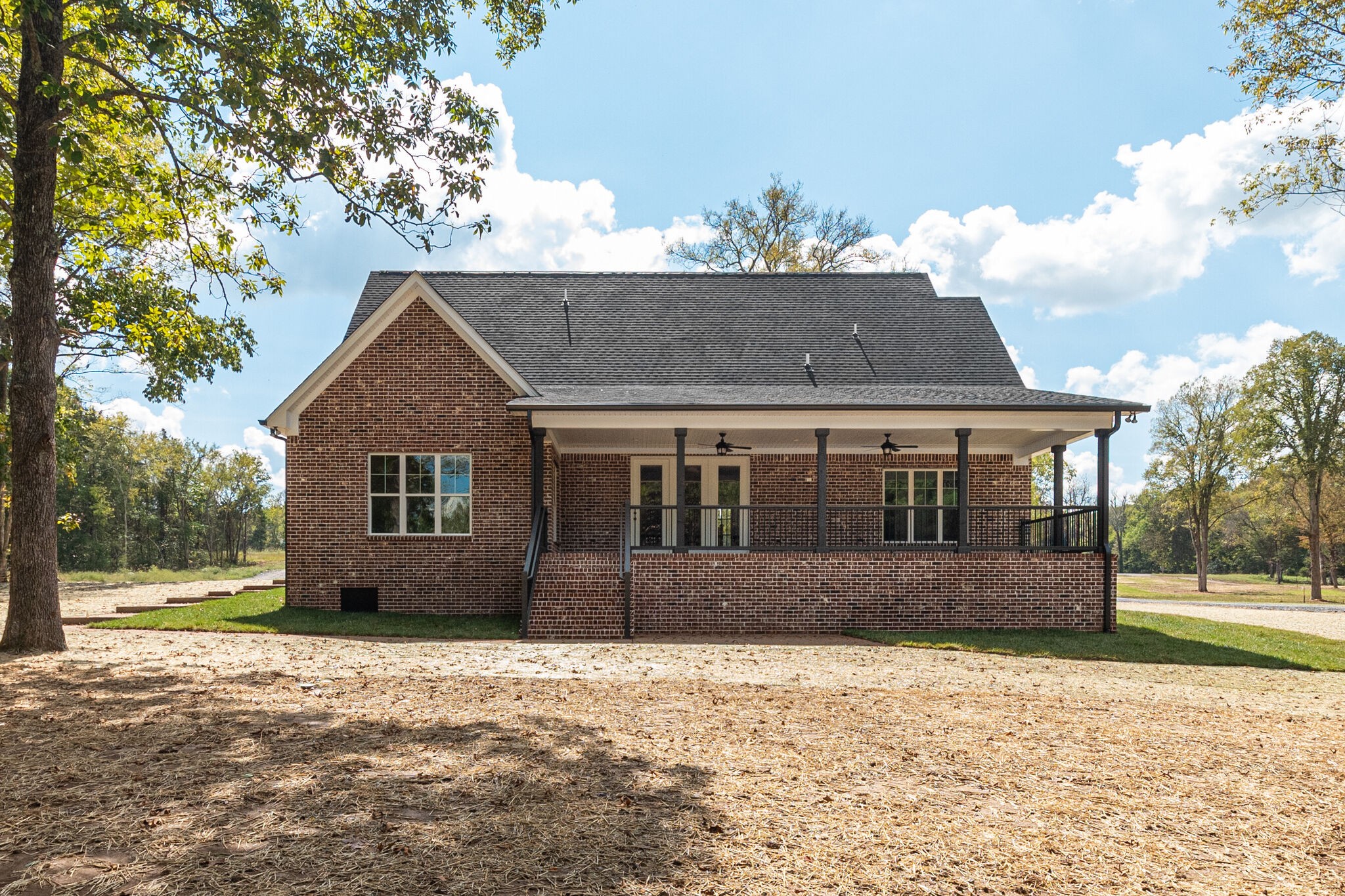 1497 Phillips Road Lebanon, TN 37087 - Photo 39 of 43 a front view of a house with a yard and garage
