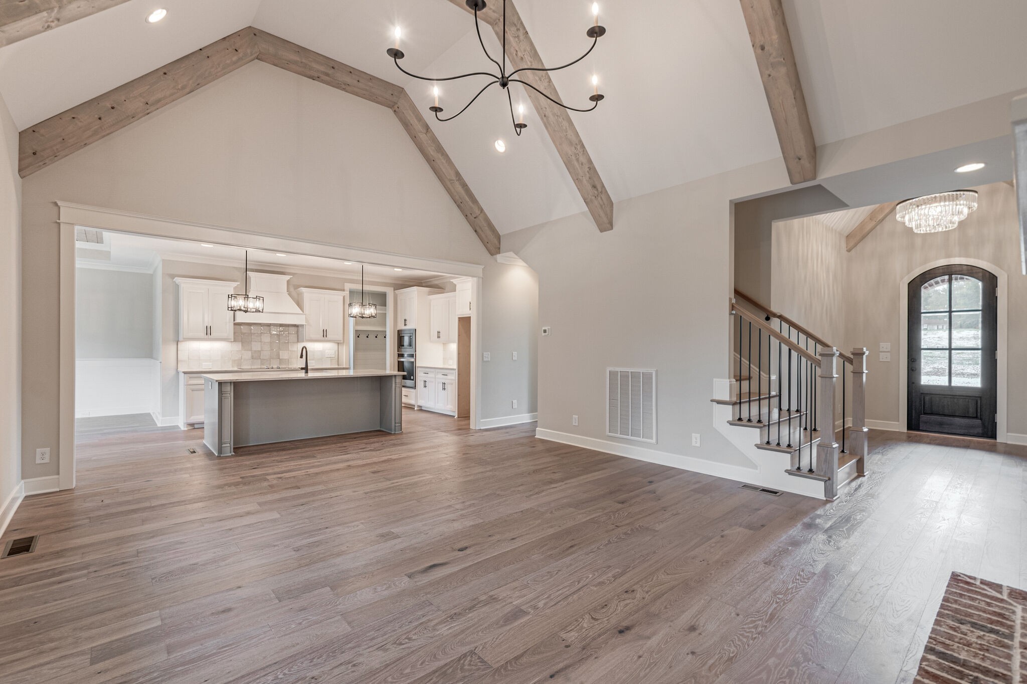 1497 Phillips Road Lebanon, TN 37087 - Photo 7 of 43 a view of a hallway with wooden floor and staircase