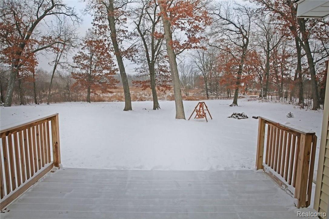 6321 West Sober Road Fowlerville, MI 48836 - Photo 39 of 43 Back deck and yard