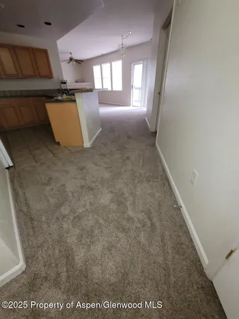 a view of a kitchen with a sink