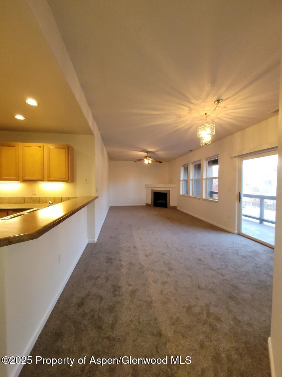 2701 Midland Avenue, Unit 511 Glenwood Springs, CO 81601 - Photo 4 of 21 a view of an empty room with a window