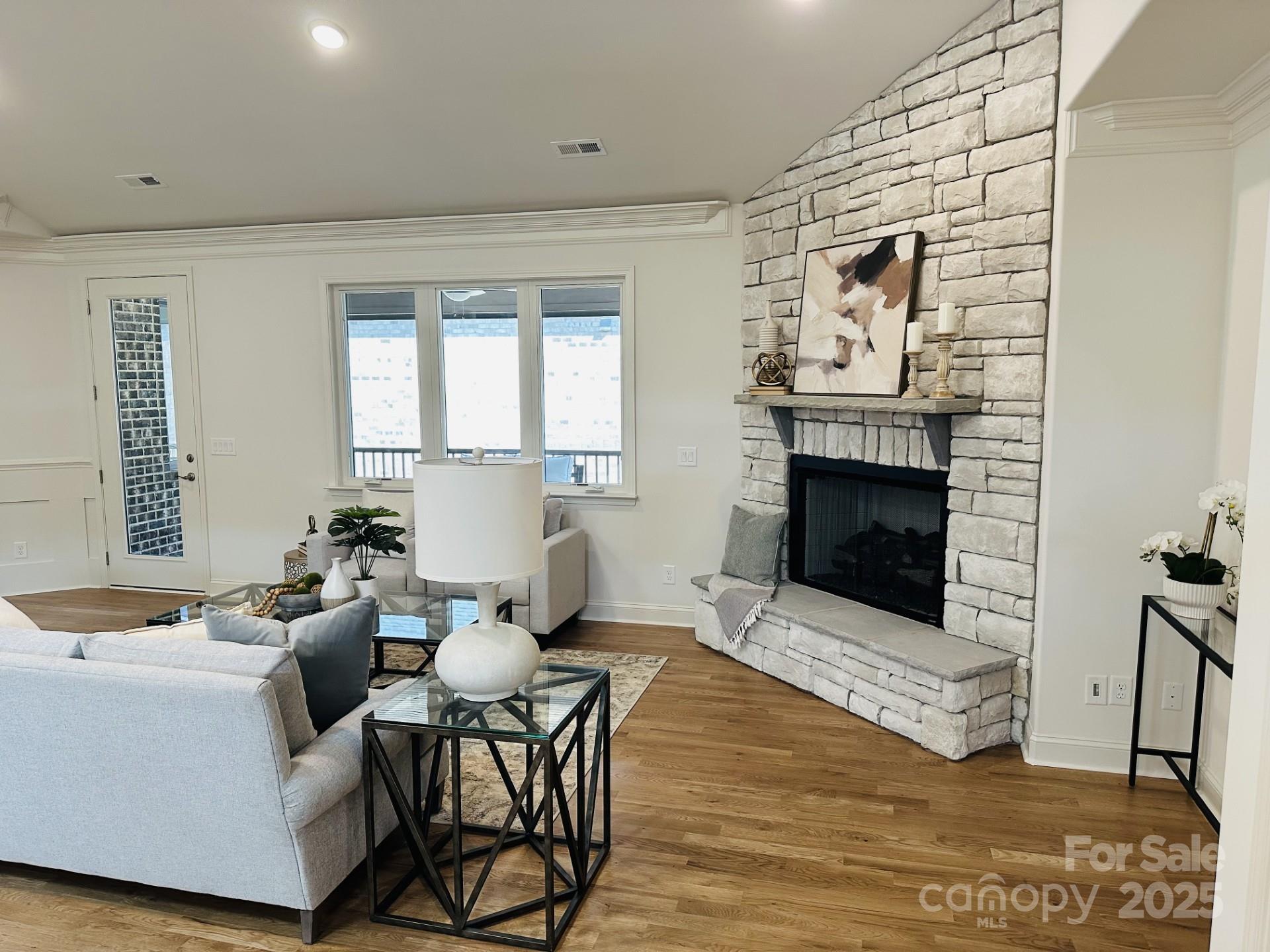 92 Silver Trce Lane Denver, NC 28037 - Photo 3 of 10 a living room with furniture and a fireplace