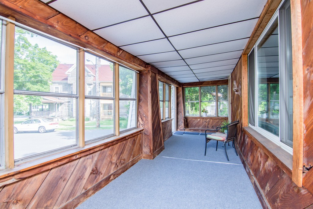 55 Crown Street Springfield, MA 01108 - Photo 25 of 30 a view of a porch with wooden floor and outdoor space