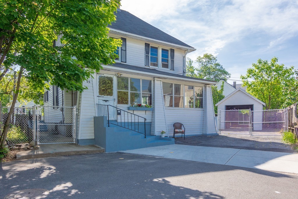 55 Crown Street Springfield, MA 01108 - Photo 30 of 30 a front view of a house with a garden