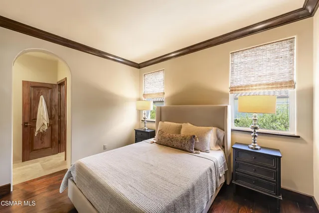 a workspace with furniture and wooden floor