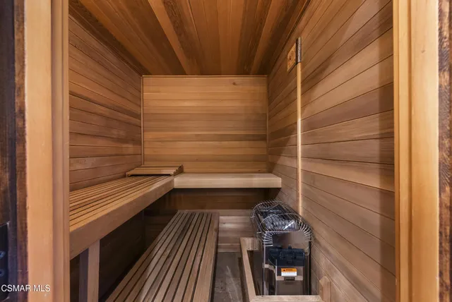 a kitchen with a refrigerator and a sink