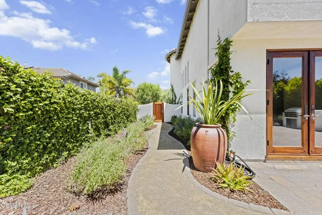 a backyard of a house with lots of green space