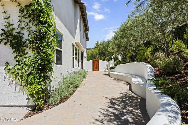 a view of a building with a yard