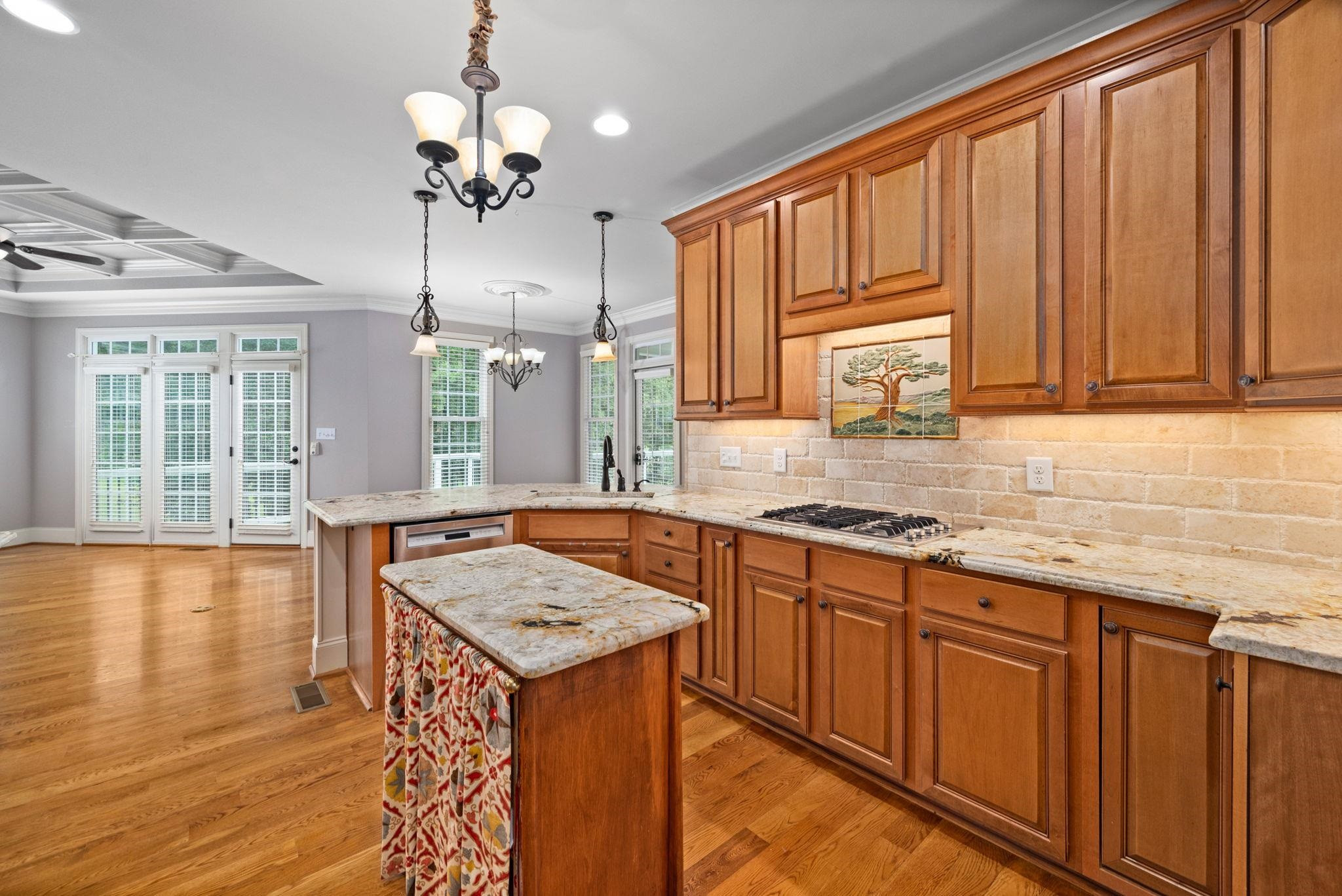 137 St Mellion Street Raleigh, NC 27603 - Photo 11 of 50 Kitchen Overlooks Breakfast Nook & Keeping Room