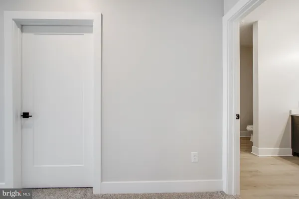 a bathroom with a sink double vanity and a mirror