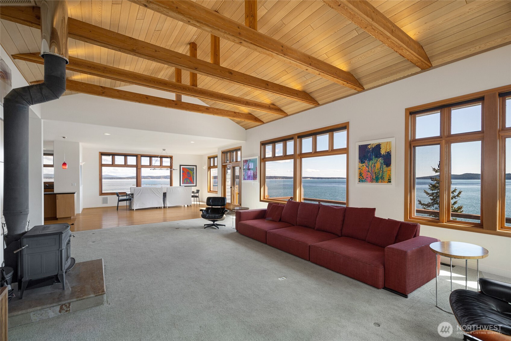 571 Golf Course Road Friday Harbor, WA 98250 - Photo 12 of 38 a living room with furniture and a large window