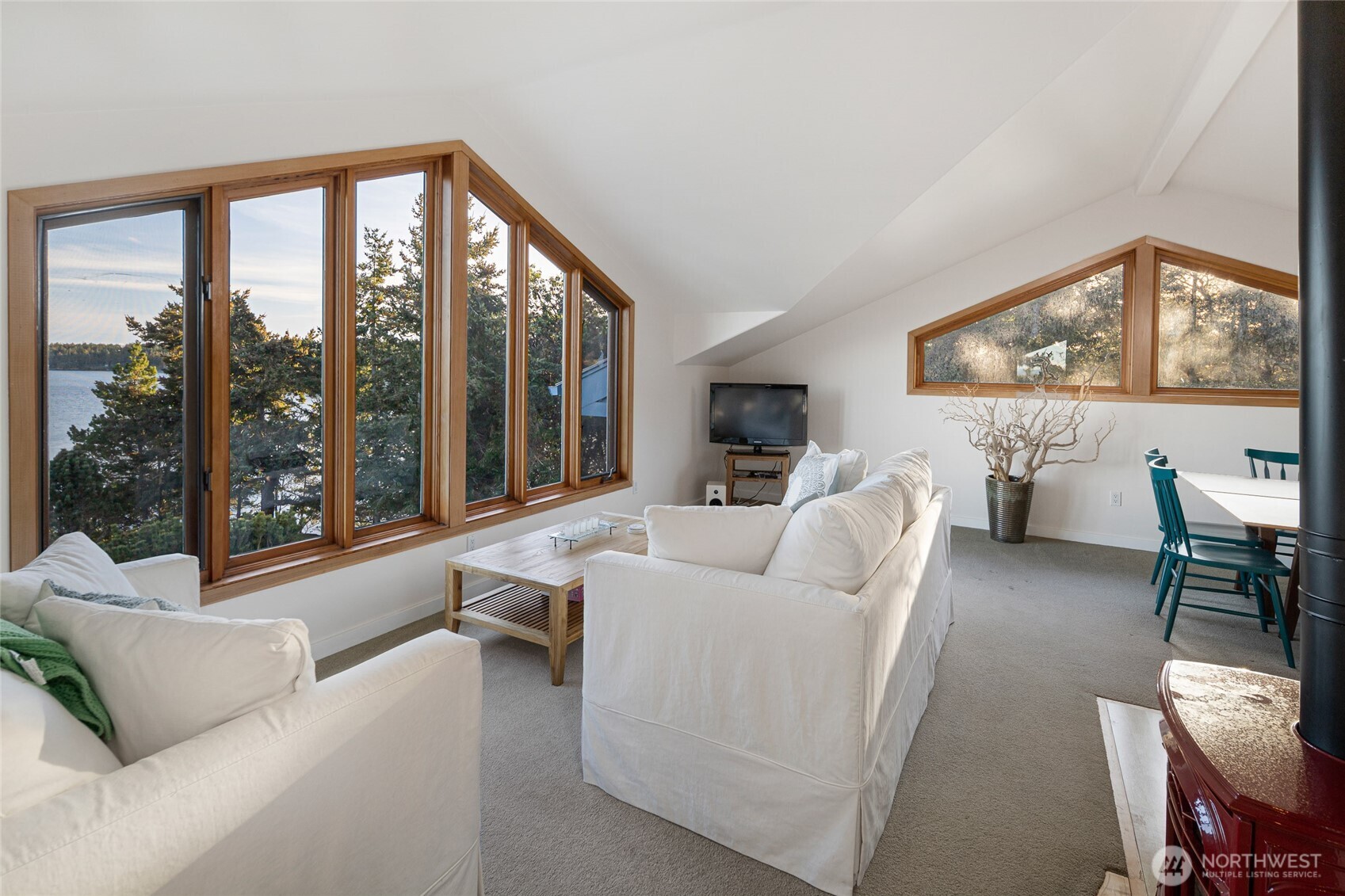571 Golf Course Road Friday Harbor, WA 98250 - Photo 29 of 38 a living room with furniture and a large window