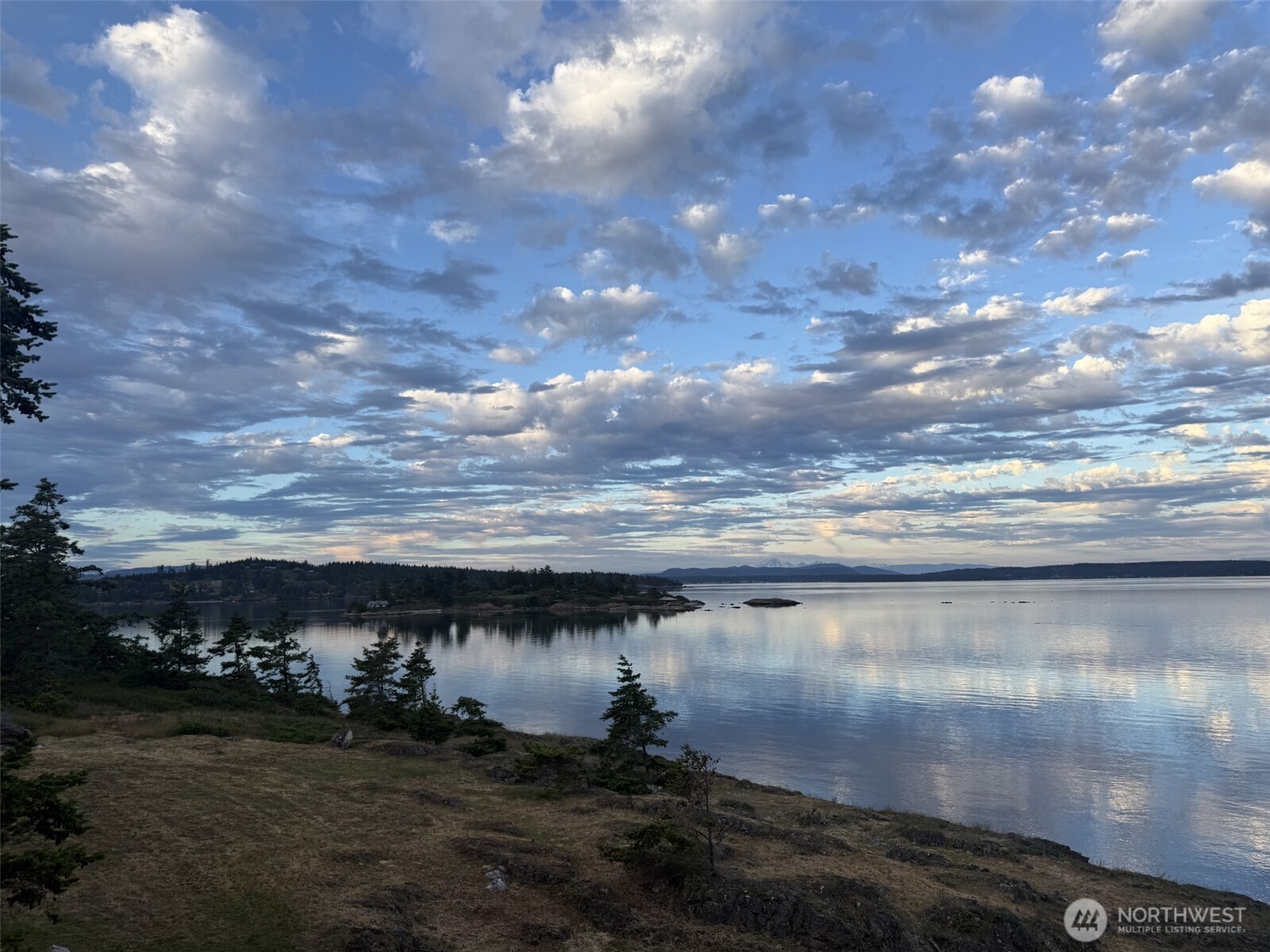 571 Golf Course Road Friday Harbor, WA 98250 - Photo 37 of 38 a view of a lake from a yard