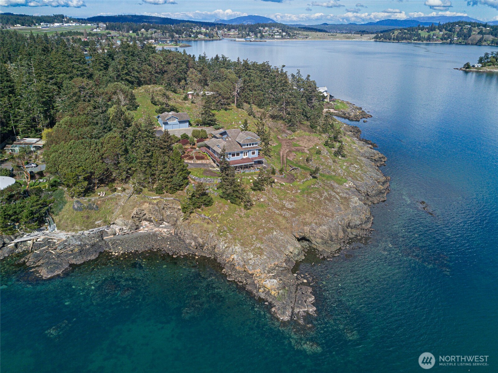 571 Golf Course Road Friday Harbor, WA 98250 - Photo 38 of 38 a aerial view of a house with a yard and lake view