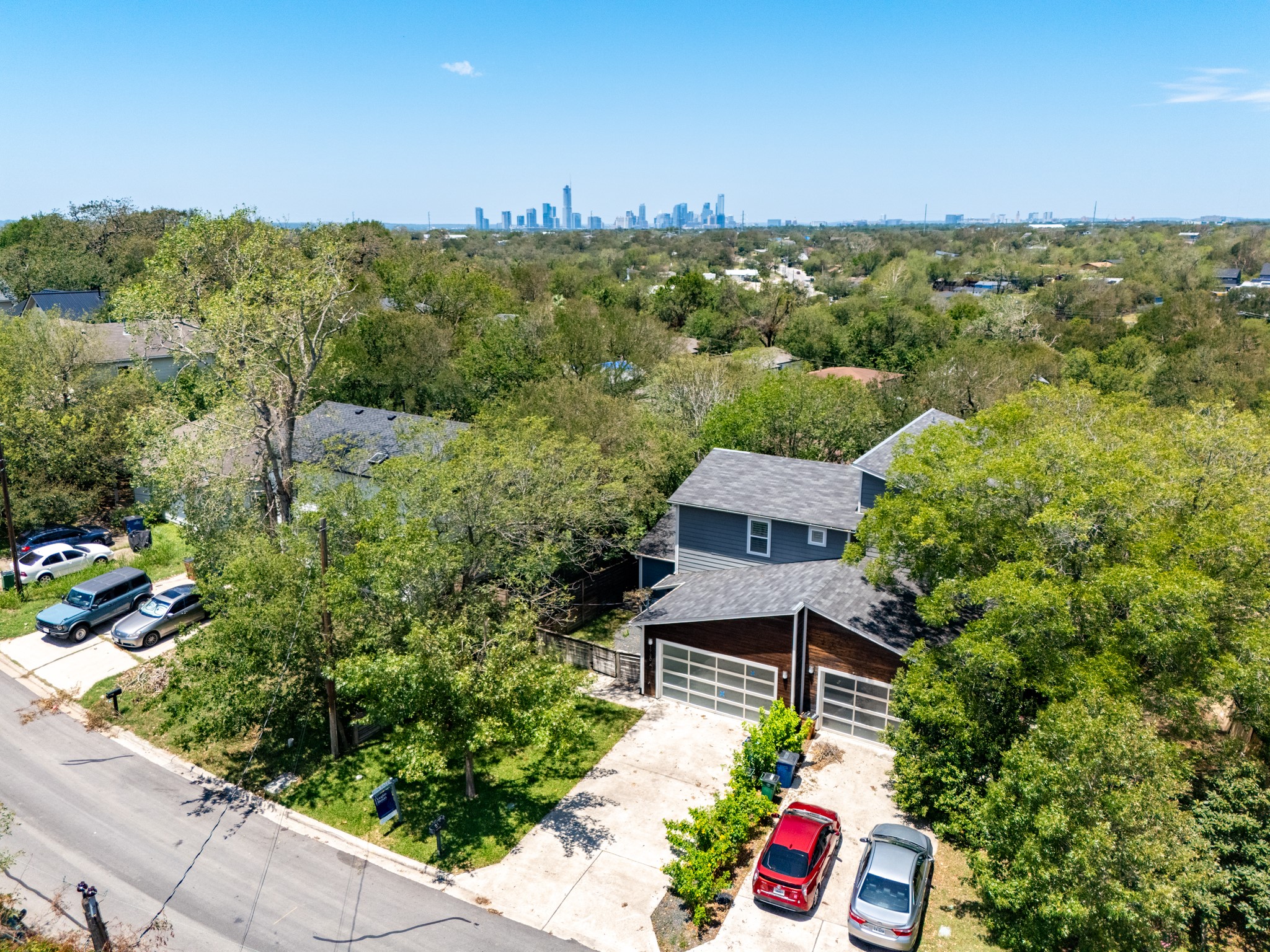 an aerial view of house with yard