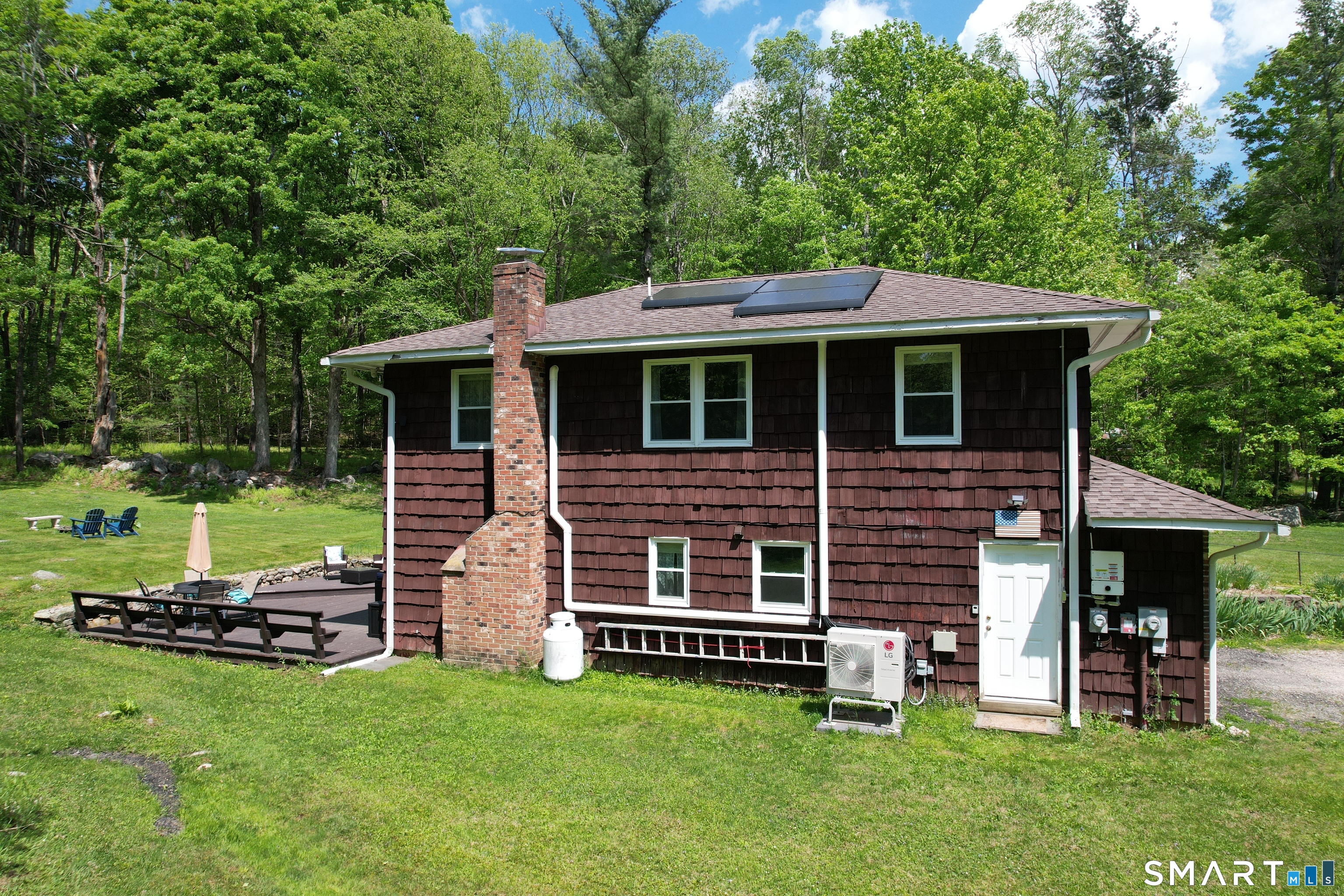 17 Colebrook Road Norfolk, CT 06058 - Photo 3 of 21 a front view of a house with a garden