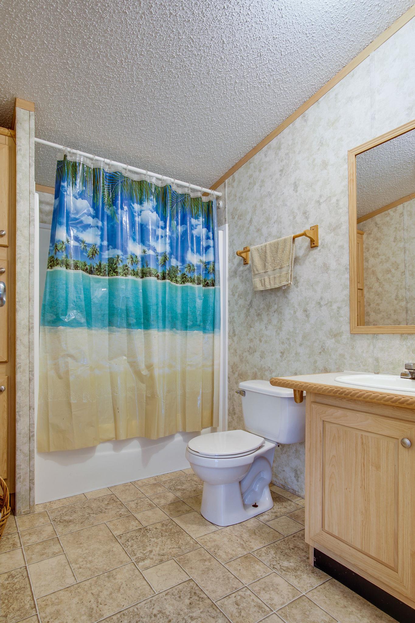 5318 Tobe Robertson Road Columbia, TN 38401 - Photo 15 of 26 The second bathroom is the perfect place for your guests to freshen up!