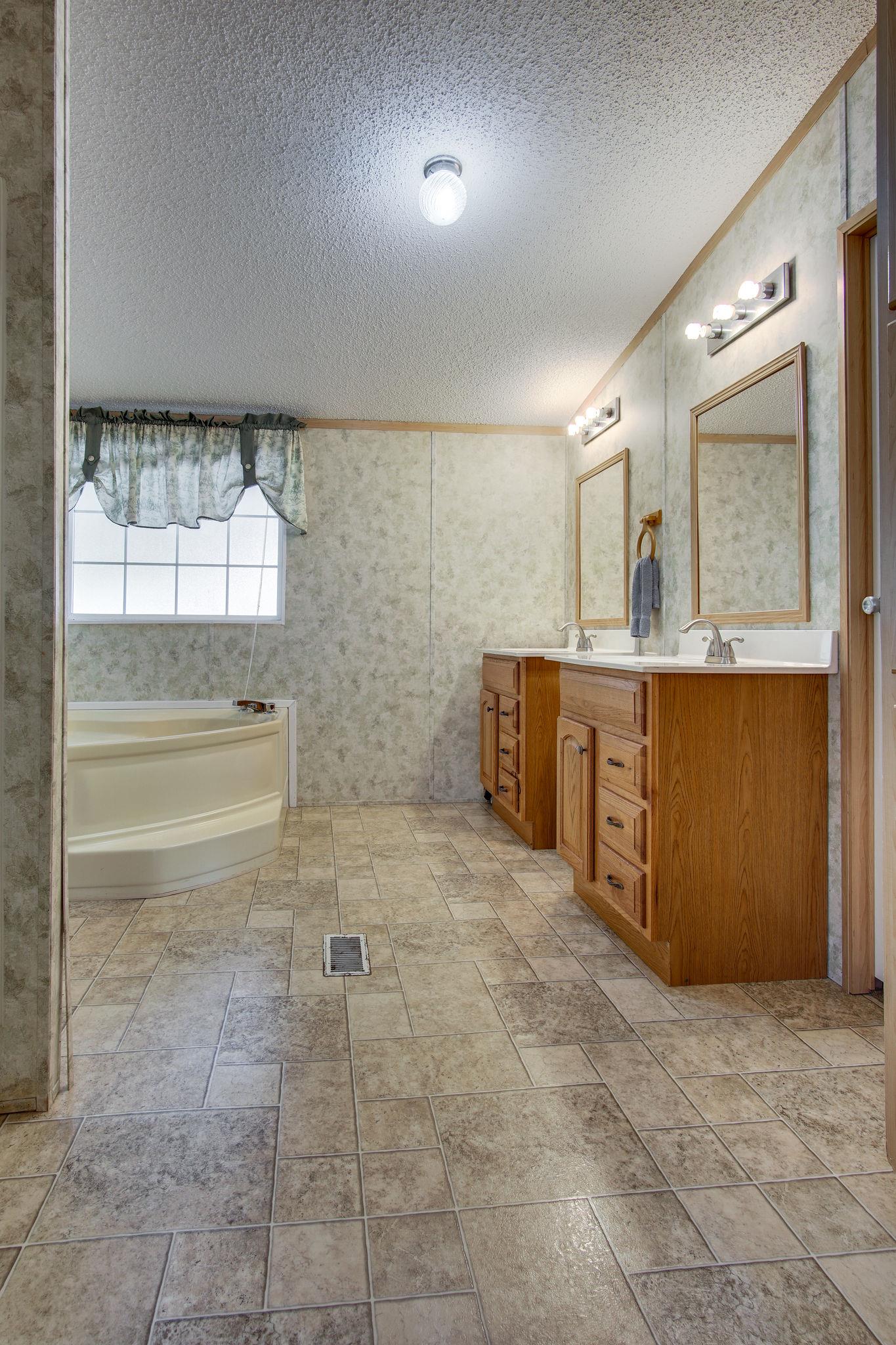 5318 Tobe Robertson Road Columbia, TN 38401 - Photo 19 of 26 The master bathroom is spacious and luxurious!