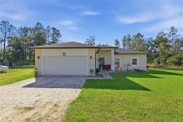 a room with lots of appliances and furniture