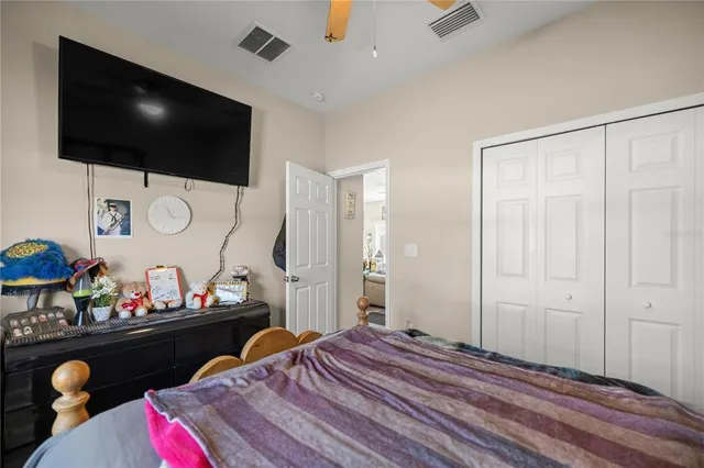 a view of work space with furniture and closet