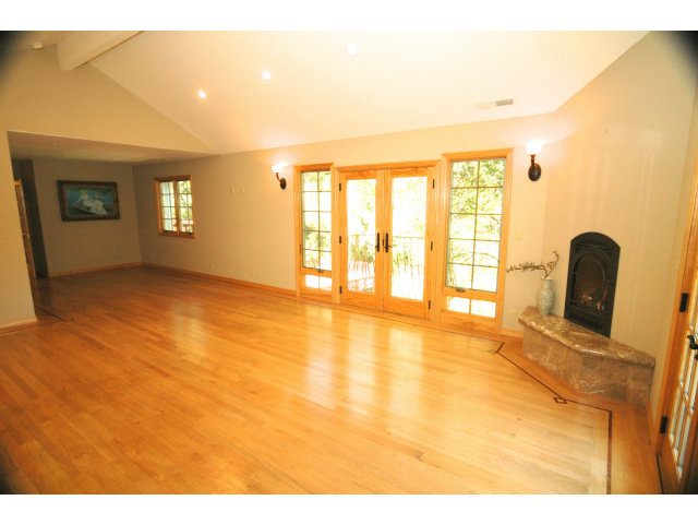 250 Lindenbrook Road Woodside, CA 94062 - Photo 8 of 13 a view of an empty room with window and a kitchen