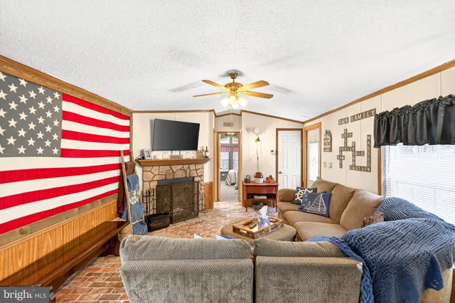 a view of a living room and a flat screen tv