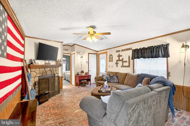a bathroom with a sink vanity mirror and toilet