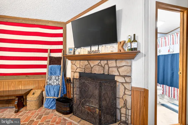 a bedroom with two beds and a window