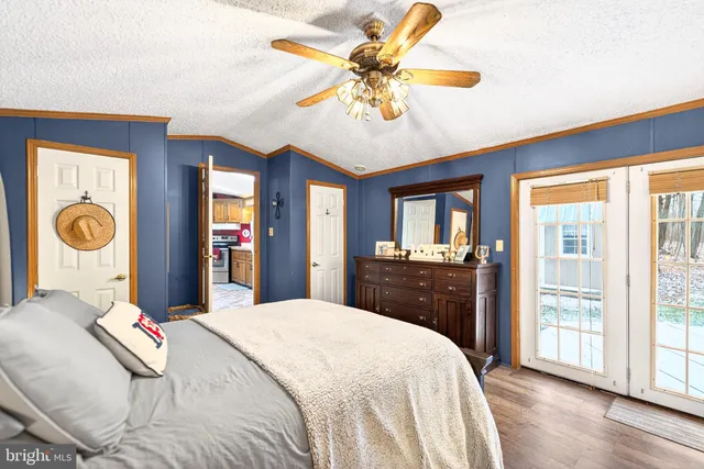 a bed room with a bed and a couch