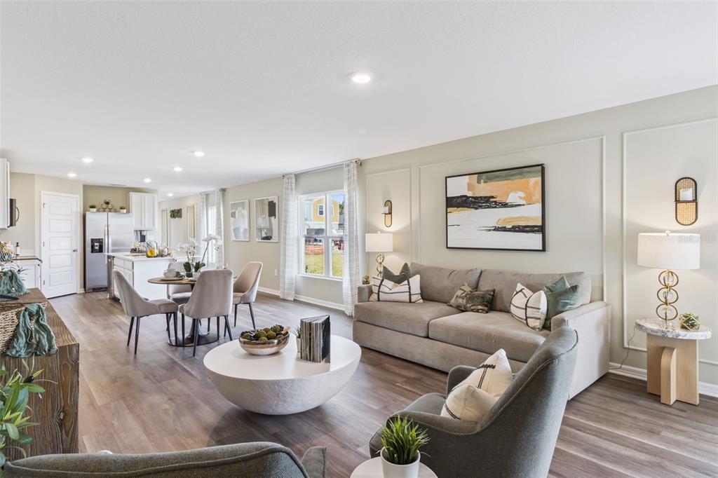 3437 Nettle Loop Tavares, FL 32778 - Photo 17 of 31 a living room with furniture and a table