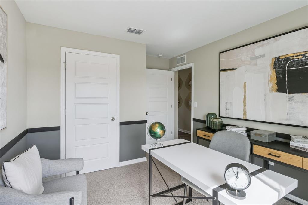 3437 Nettle Loop Tavares, FL 32778 - Photo 26 of 31 a view of a kitchen area with furniture