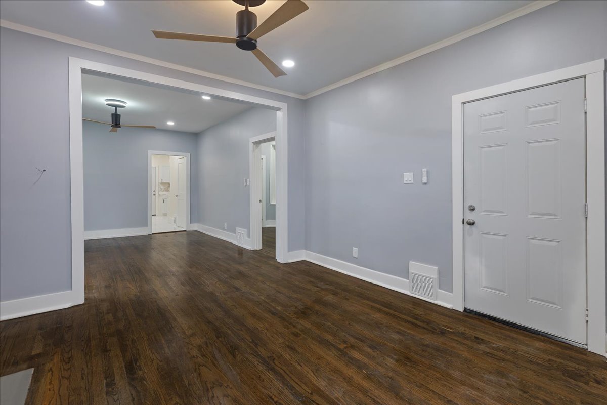 4626 West Monroe Street Chicago, IL 60644 - Photo 12 of 34 an empty room with wooden floor and windows